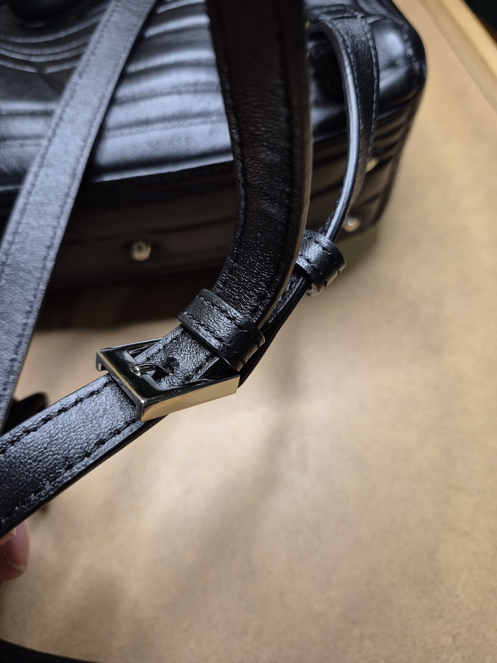 Black Quilted Leather Backpack with Polished Metal Clasp - Picture 7 of 11